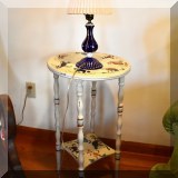 F84. Stenciled side table.